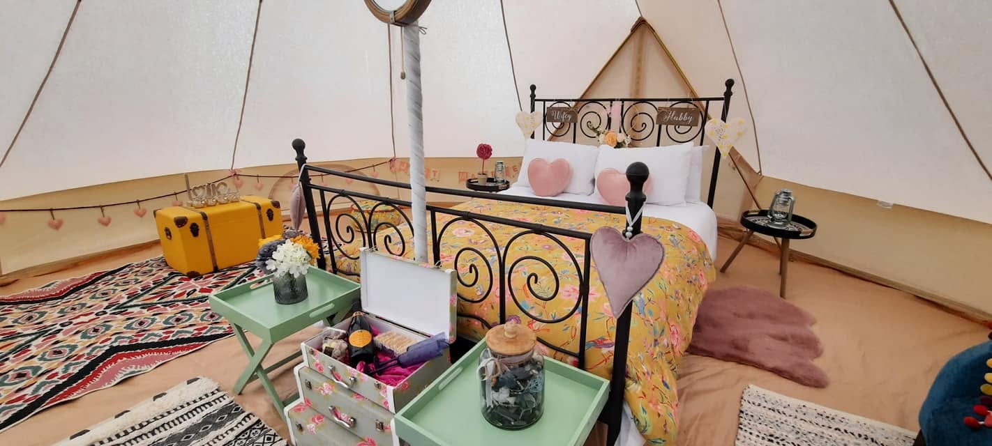 Furnished bell tent accommodation for wedding guests